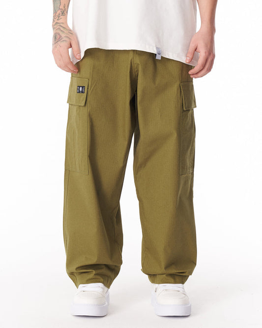 Martin Valen khaki wide-leg trousers with adjustable cuff, front mid-body view showing cargo pockets and side label