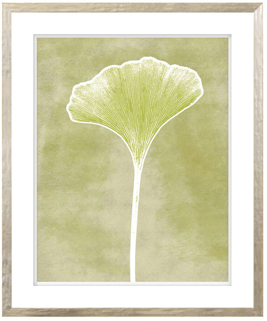 A framed artwork featuring a single ginko leaf on a chartreuse green background with a raised matte detail and a contemporary silver profile.