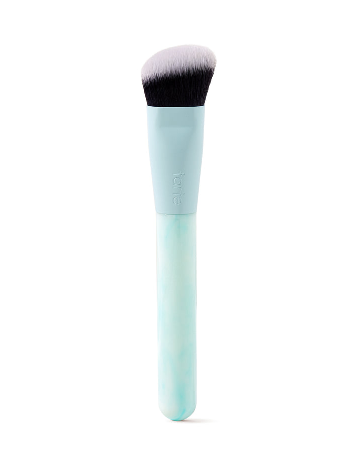 Makeup brush with a light blue handle on a white background