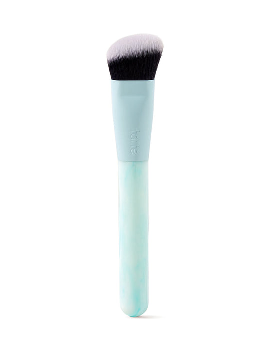 Makeup brush with a light blue handle on a white background