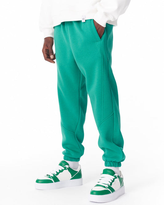 Martin Valen bright green corded jogger, three-quarter side view showing pocket and stitch details