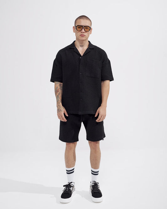 Martin Valen men’s waffle tracksuit set in midnight black, full frontal view with matching shorts