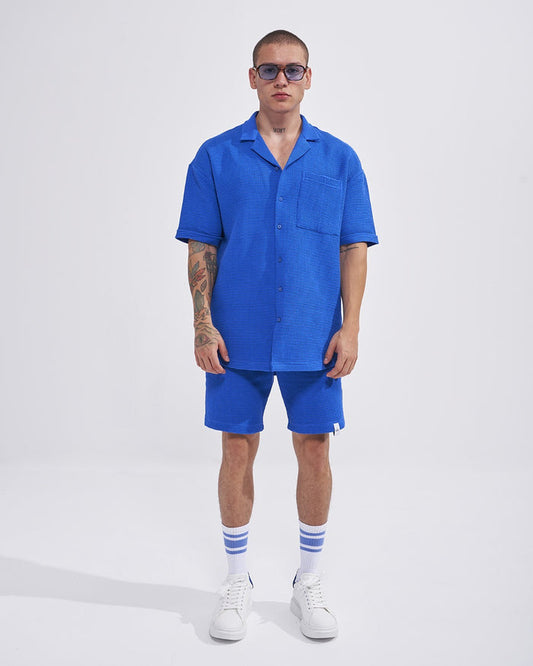 Martin Valen men’s sax blue waffle tracksuit set with shorts, full‑body front view showing short‑sleeve shirt and matching shorts