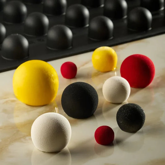 Showing pastry creations from a flexible nonstick silicone molds from Pavoflex in multiple colors.