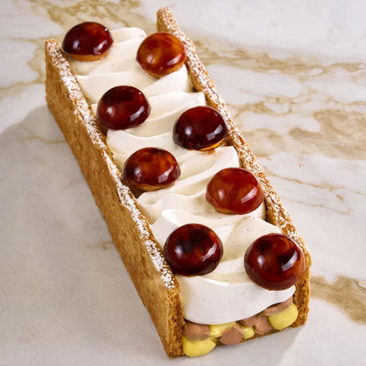 Puff Pastry Cake Mold 2 Piece showing pastry on marble table background.