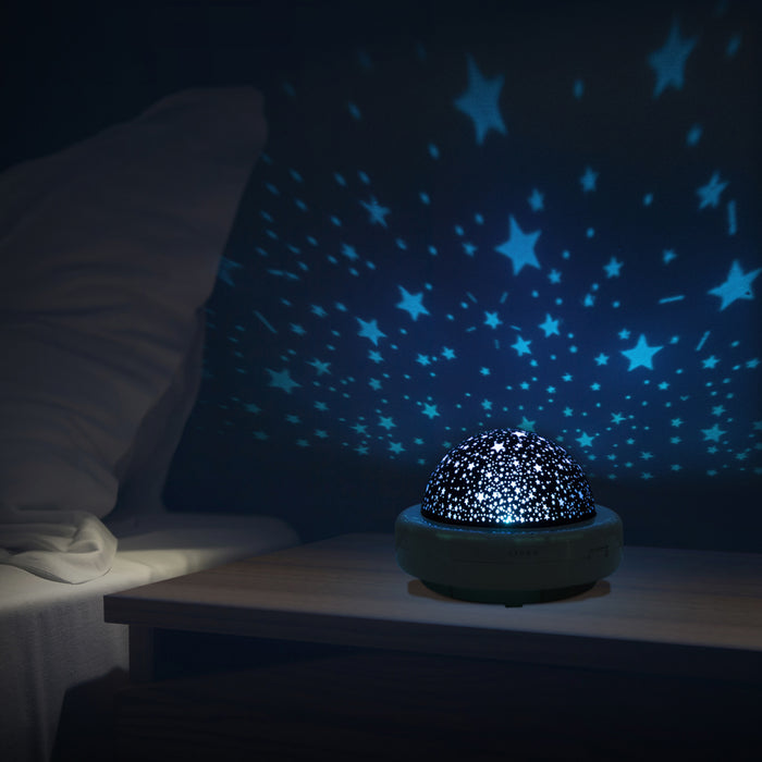 Zadro STARPRO4C 705004424370 environment photo side view in dark bedroom, starlight projector & sound spa in front of a real life setting