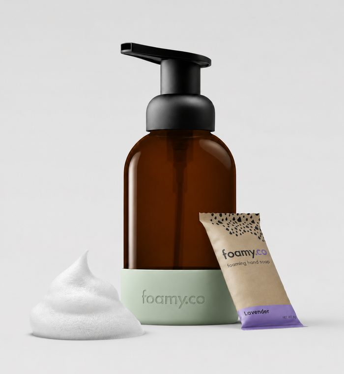 The Cloud Foam Kit featuring an amber glass bottle, foaming hand soap, and lavender refill.