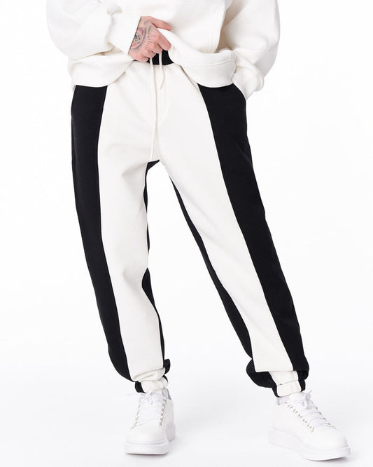 Martin Valen V'Reverse bicolor black and white jogger, front mid-body view showing drawstring and side panels